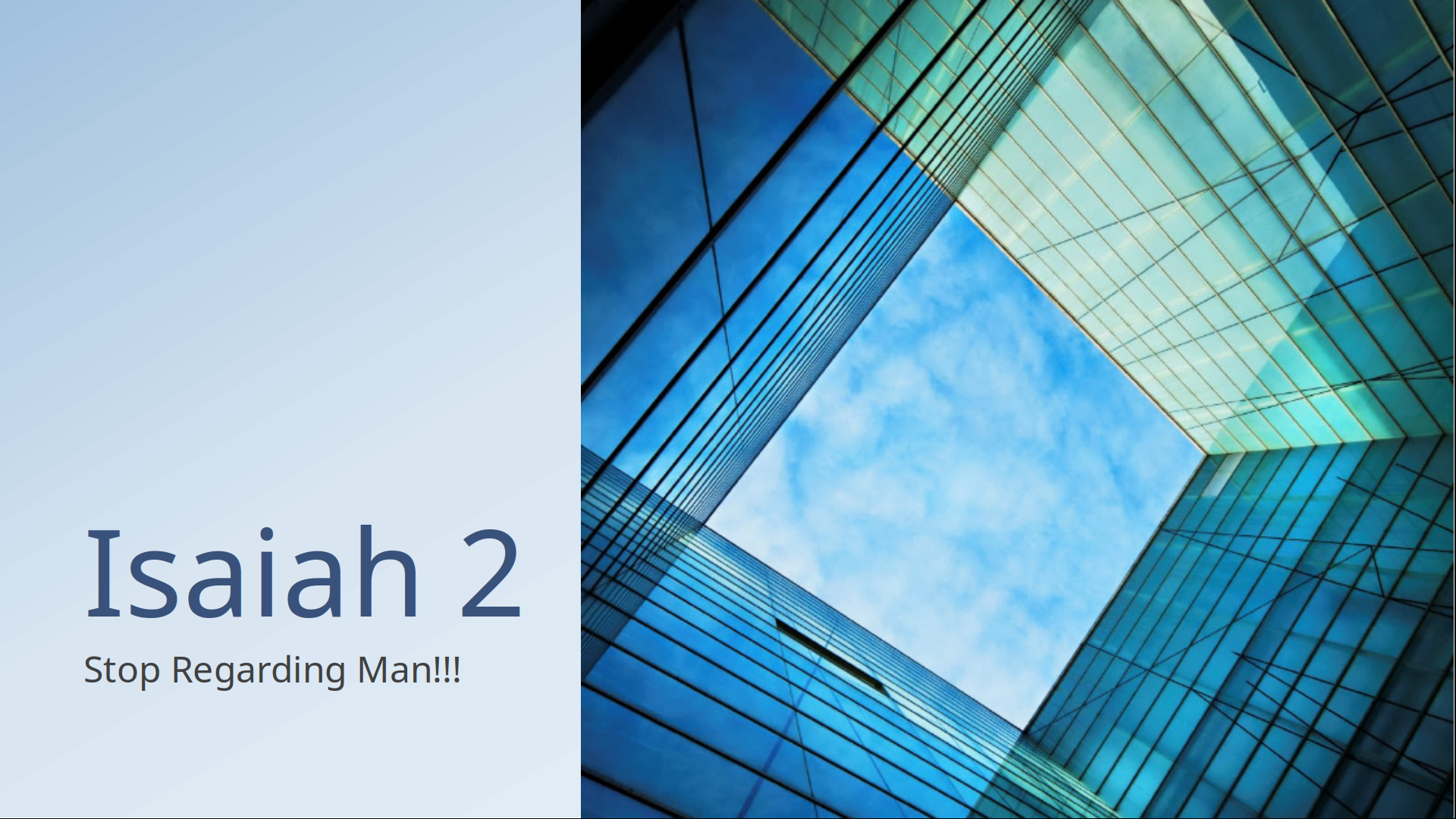 An photo looking up through columns of tall, grand, glass buildings.